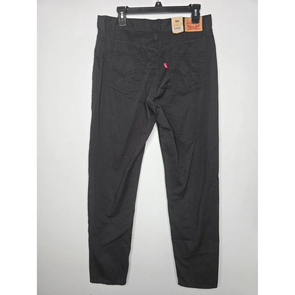 Levi's Black High Rise Tapered Leg 80s Mom Jeans Womens 31x30 IRREGULAR NWT